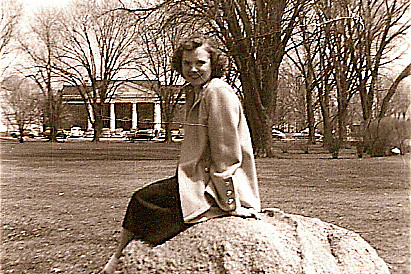 Kathleen (Peterson) Bradley is shown sitting on Kissing Rock at the Illinois campus, where she and husband Harry Bradley '53 attended.
