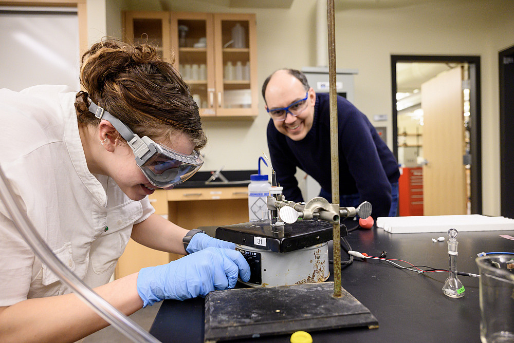 Chemistry Professor and Student working on experiment