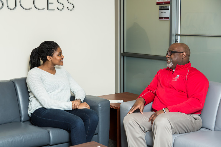 A Carthage College student meets with her advisor to discuss career paths.