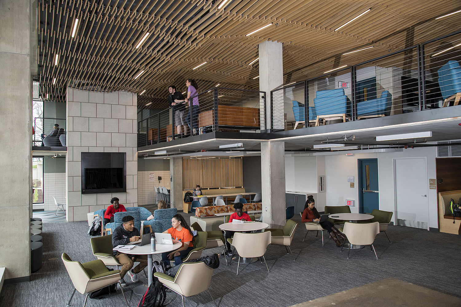 The Tower's main floor lounge has plenty of seating for students to study and hang out with friends, TVs, a kitchenette, and gorgeous vie...
