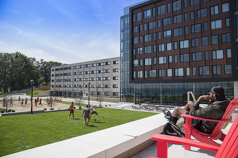 The Tower Terrace includes an outdoor seating area and volleyball court.