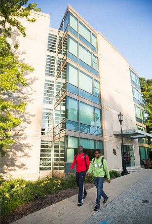Students walking outside of The Oaks.
