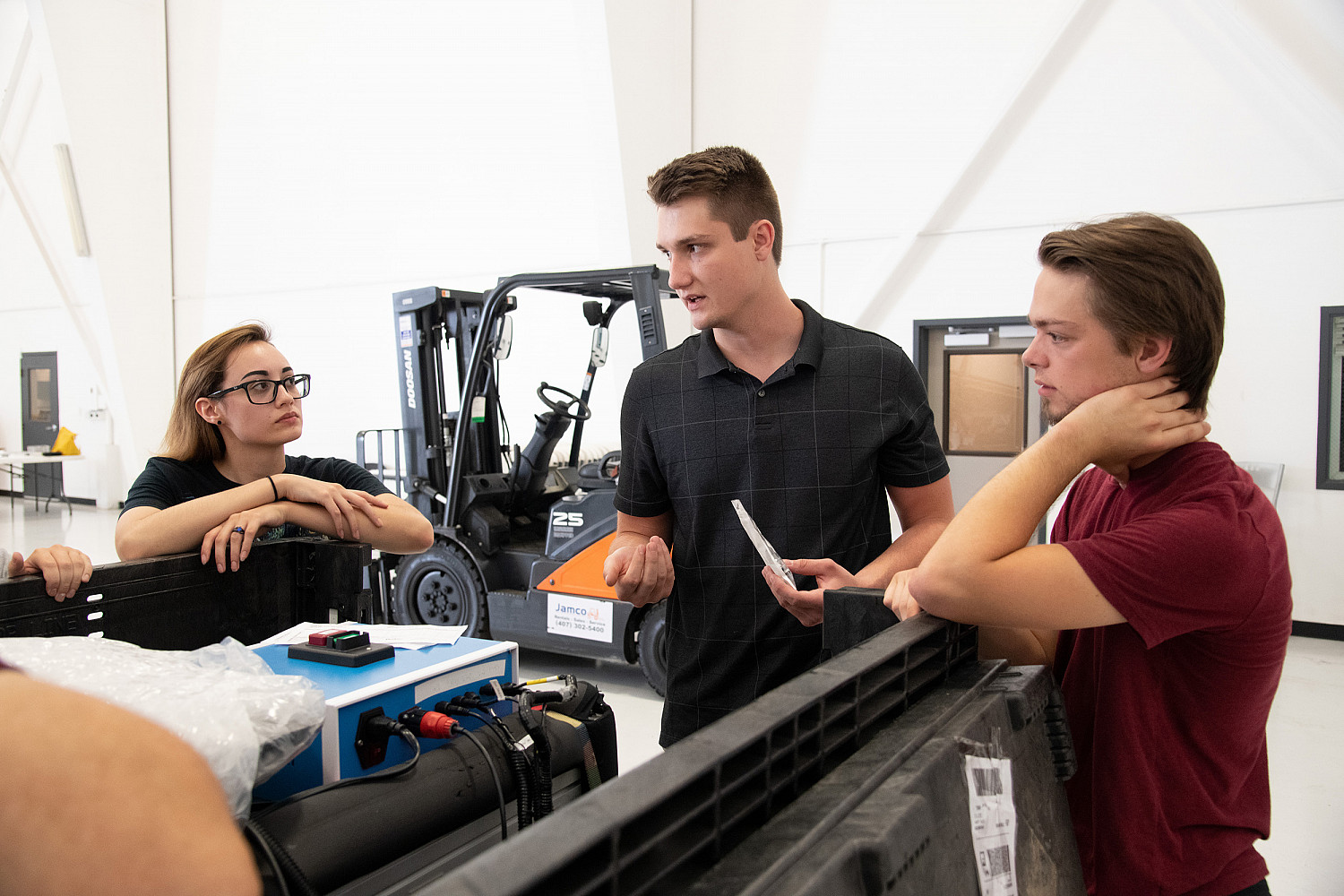 Carthage microgravity students and their Magneto-active Slosh Control (MaSC) experiment preparing for a Test Readiness Review prior to a ...
