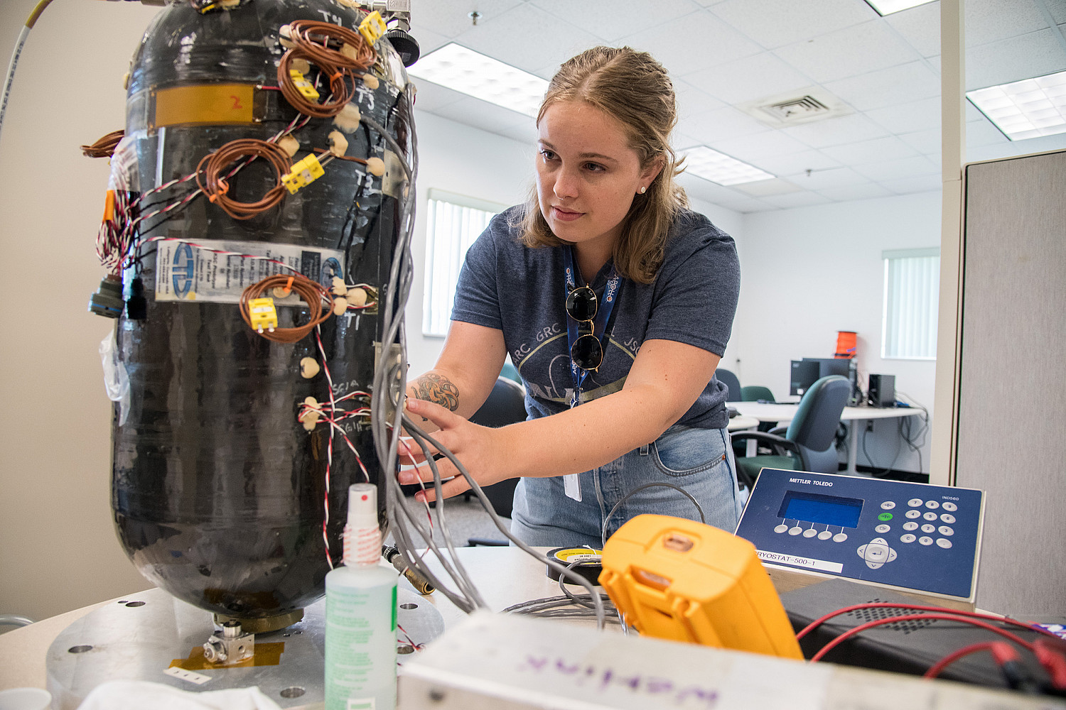 Carthage alumna, Celestine Ananda, works on the MPG experiment during her internship at NASA Kennedy Space Center.
