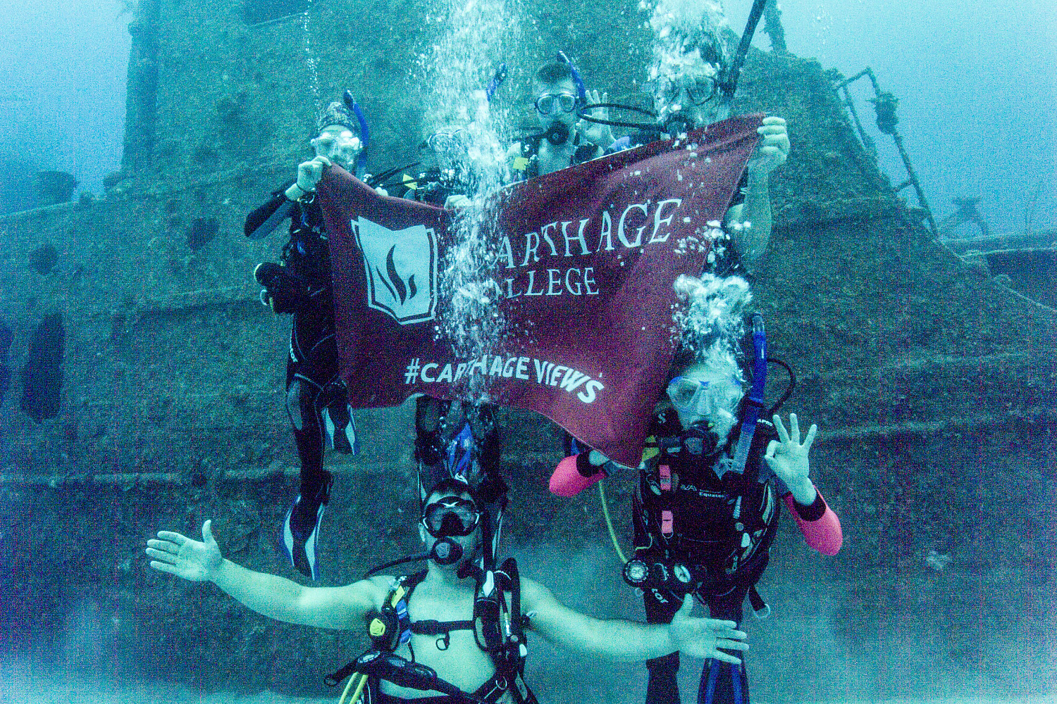 Underwater exploration: Students scuba dive in Honduras for the J-Term study tour Biodiversity, Brains and Behavior.