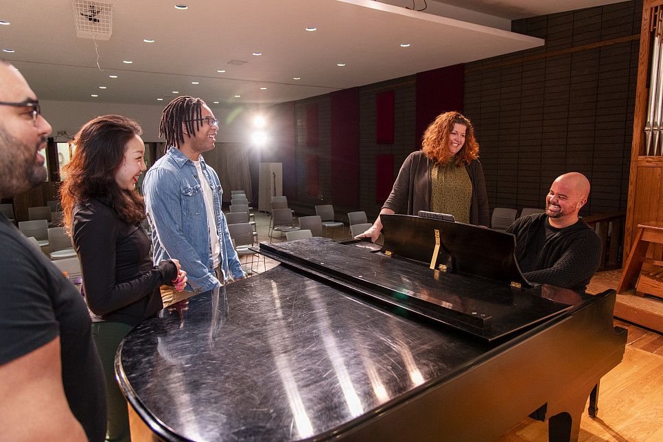 Carthage College professors Corinne Ness and Matthew Hougland work with students in Carthage's re...