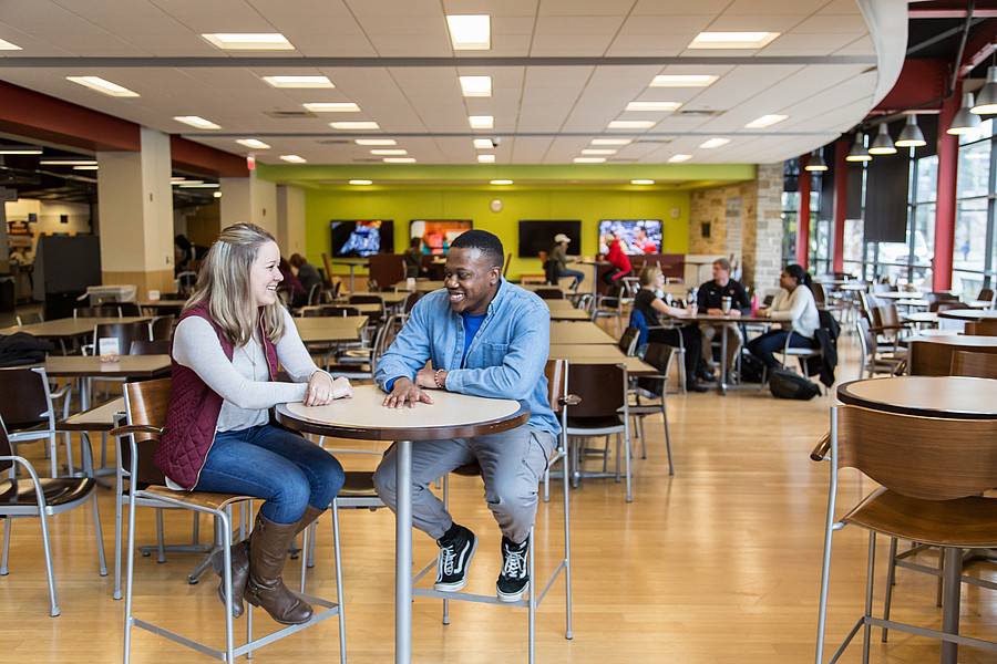The seating area can accommodate a large group of guests.