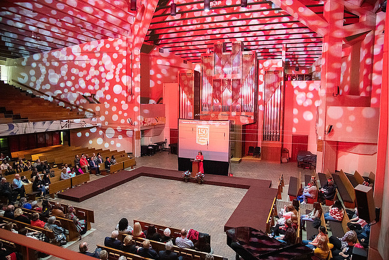 Enhance your event in the chapel with a stage setup, professional sound, and video services.