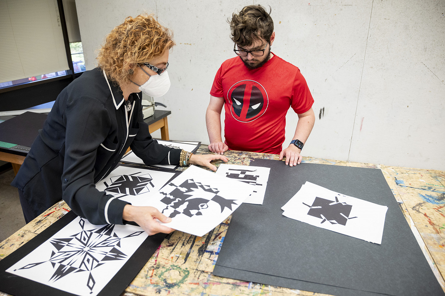 Prof. Jojin Van Winkle and David Kirson '25 discuss designs in Foundations, Surfaces: Images + Design (Fall 2022).