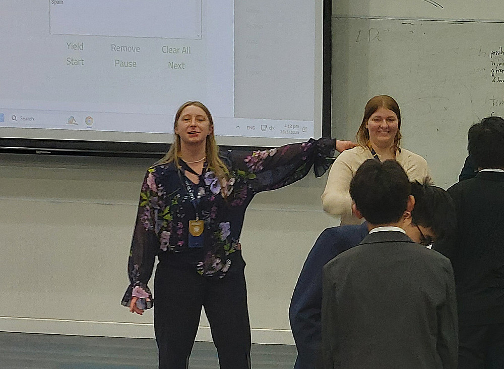 Sarah Beck '27 (left) representing Turkey in the Food and Agriculture Organization (FAO) and Mackenzie Manke '27 (right) representing the...