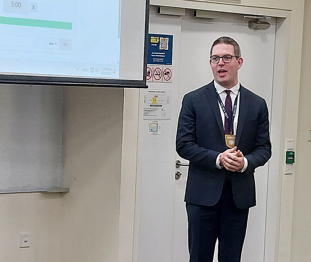 Nathan Swensen '26 representing Kim Il, North Korea's Vice Premier in the Joint Cabinet Crisis (JCC).