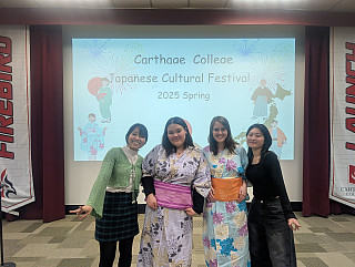 A group of students in Japanese clothes.