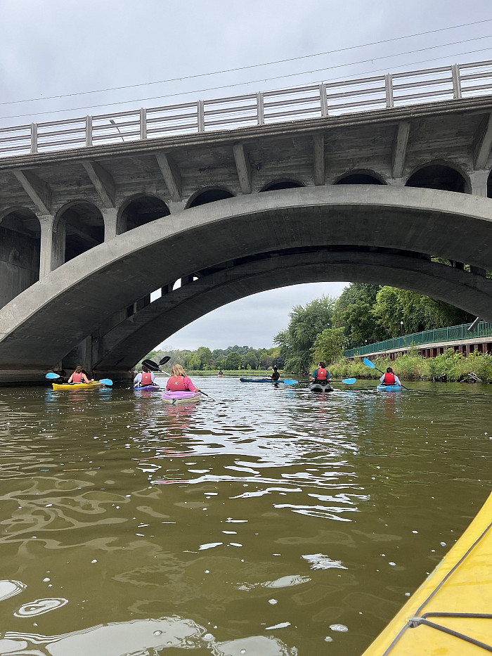 Carthage history seniors kayak along the Root River in Racine, Wisconsin.