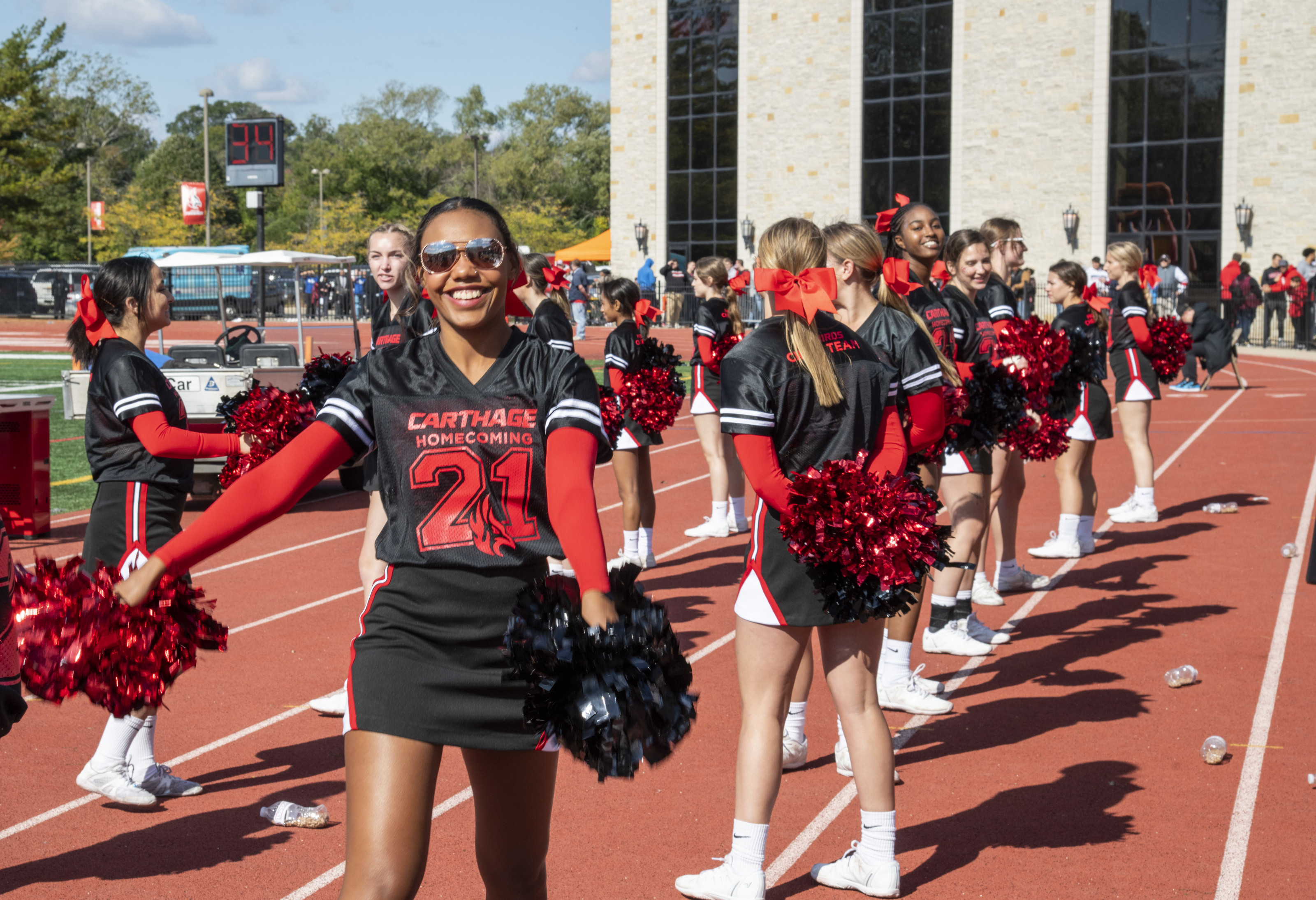 The Carthage Spirit Team cheers on the Firebirds.