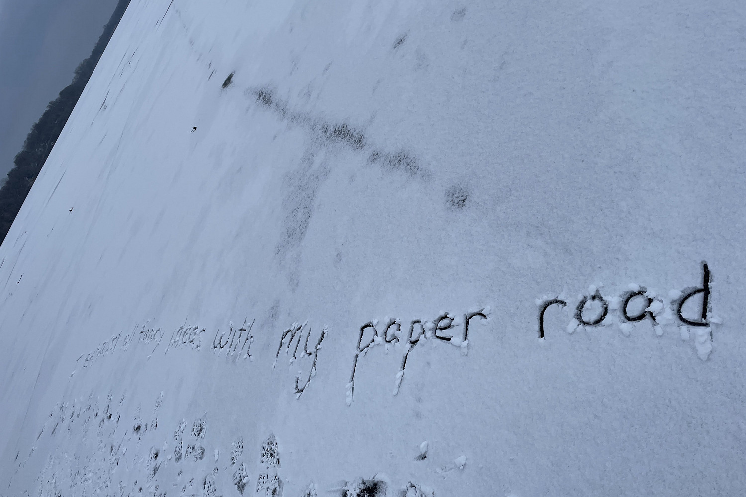 Writing in the snow composed during Writing/Walking/Winter class.