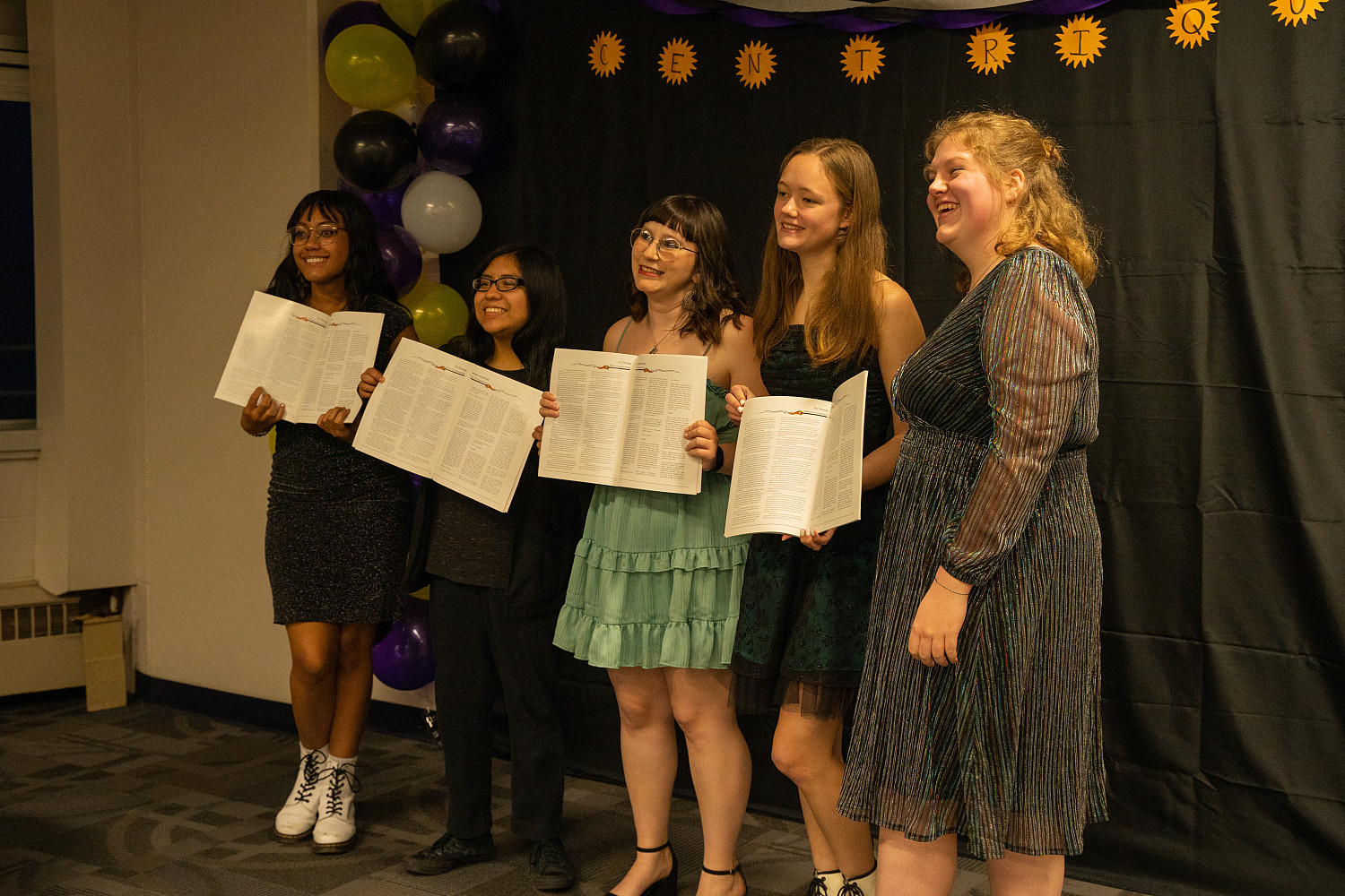 Students celebrating a new magazine edition at Centrique's Publication Premiere Night.