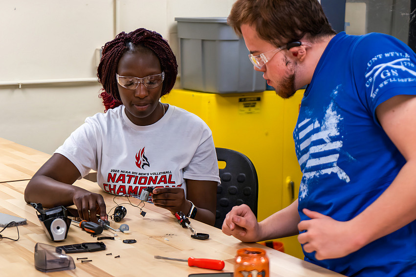 Engineering students working on projects.
