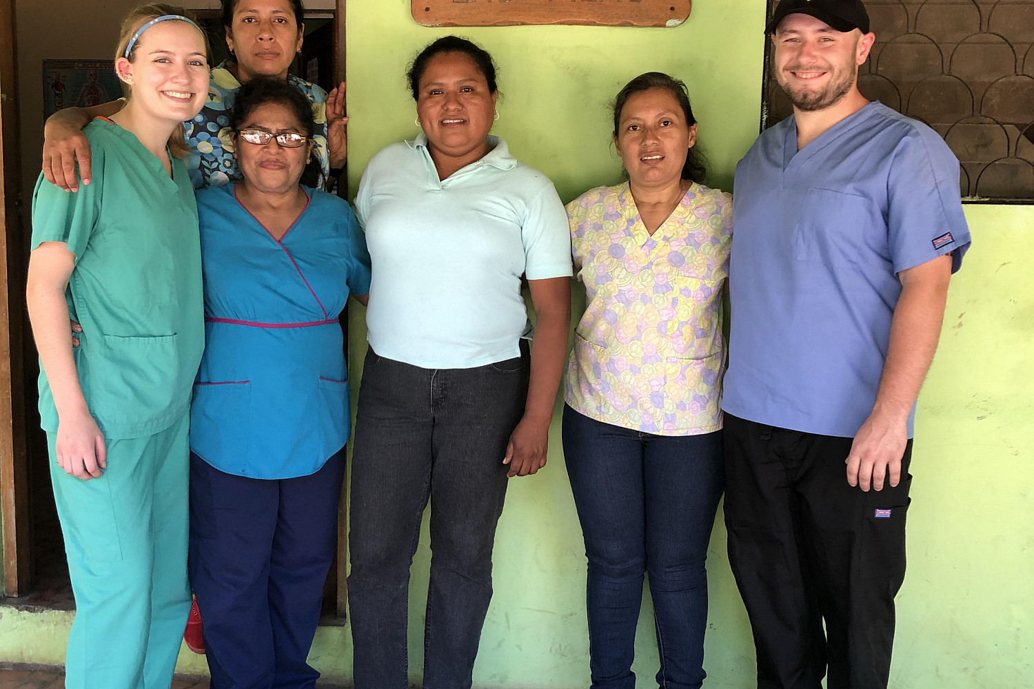 Students with locals at a wellness center.