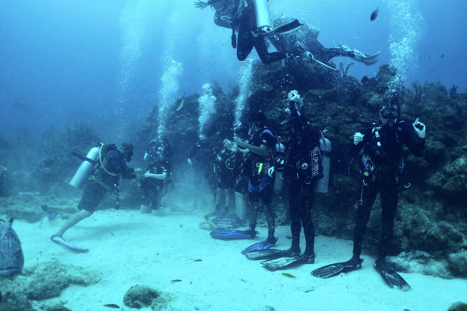 Students scuba diving in Honduras for J-Term.