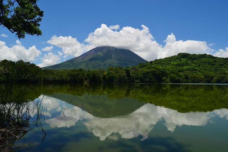 Volcanic island of Ometepe reflected in the water.