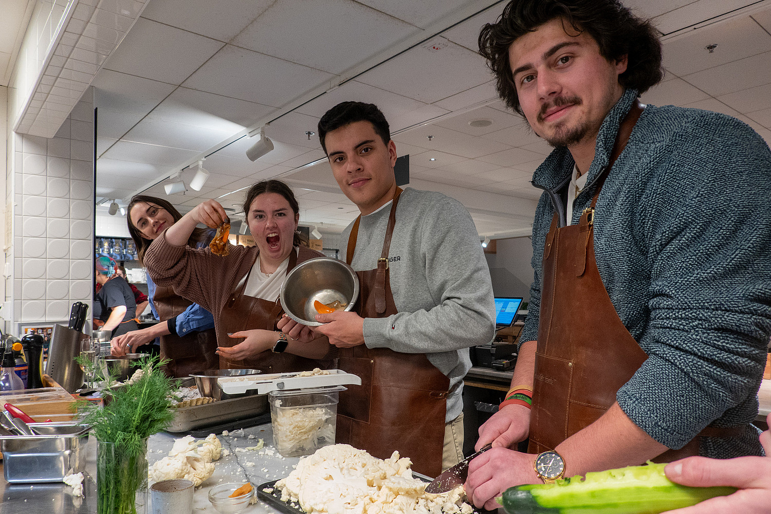 Students enhance their culinary skills during a cooking class.