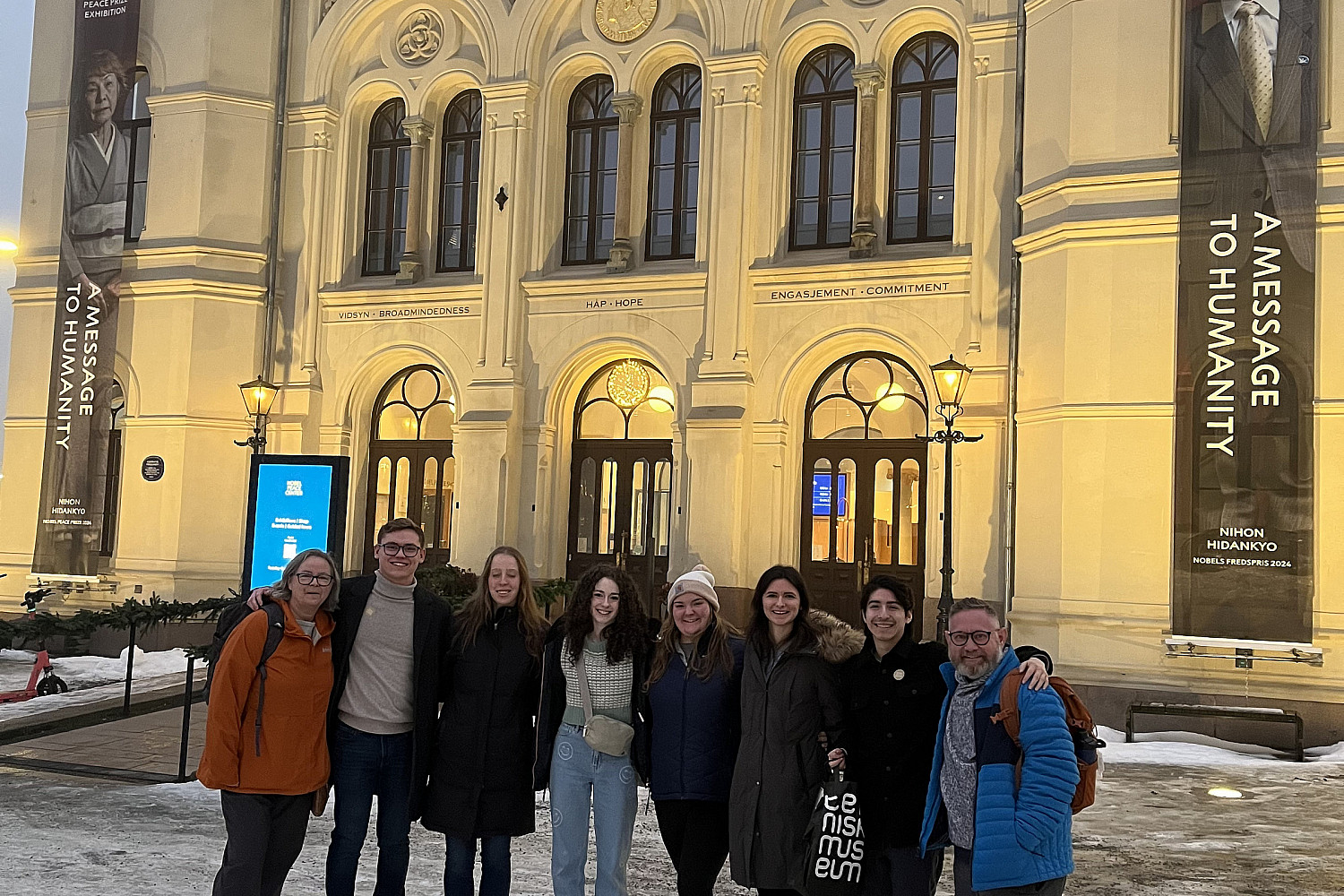 A group photo in front of the Nobel Peace Center.