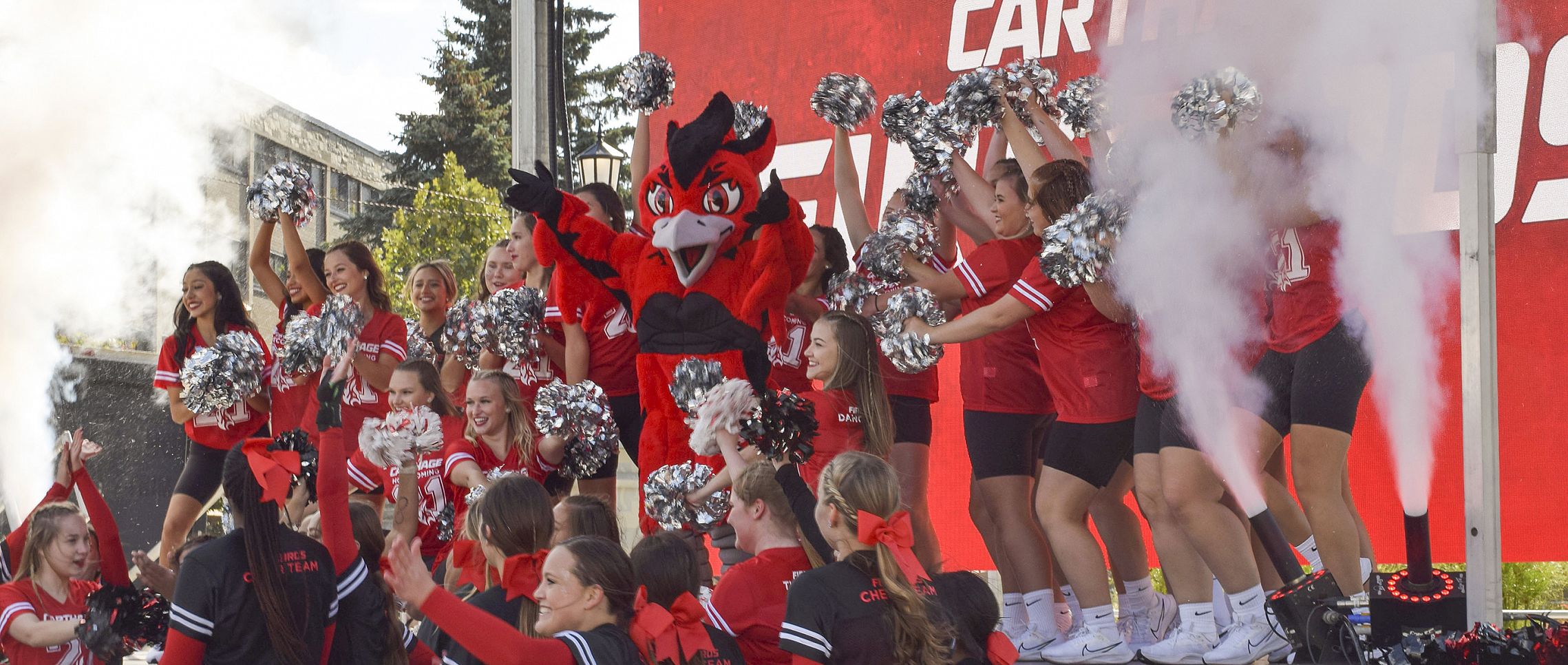 The Carthage College spirit team reveals Ember, the new Firebirds mascot, during Homecoming Weekend 2021.