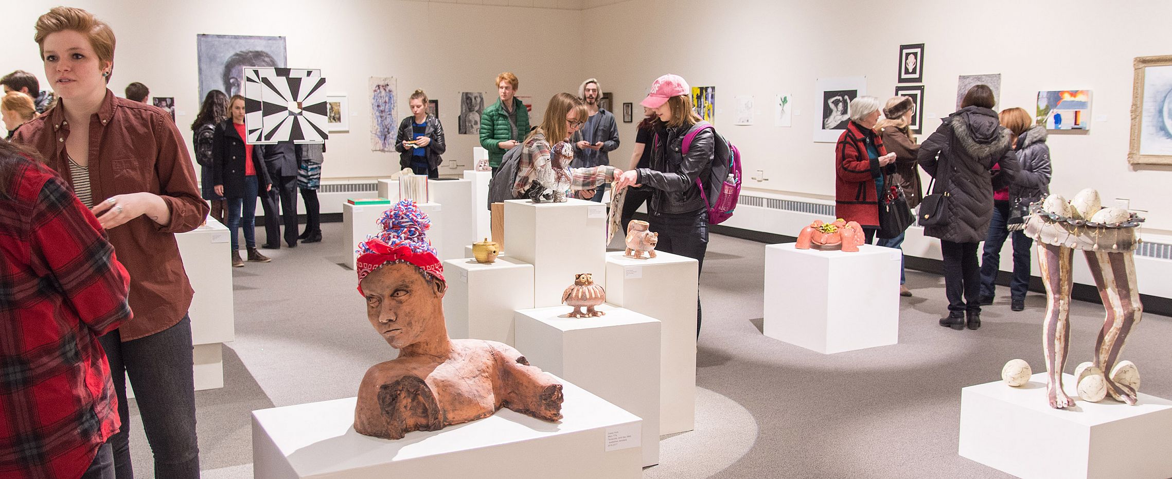 A gallery opening at the H. F. Johnson Gallery of Art.