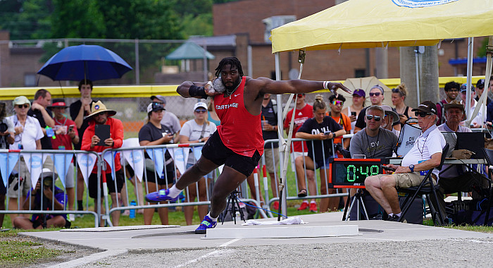 Joseph White competes in the outdoor NCAA shot put.