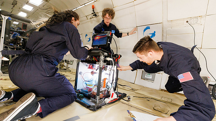 Carthage students experiment on a parabolic aircraft.